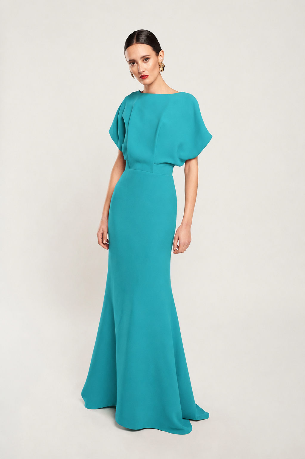 Ana's long green dress